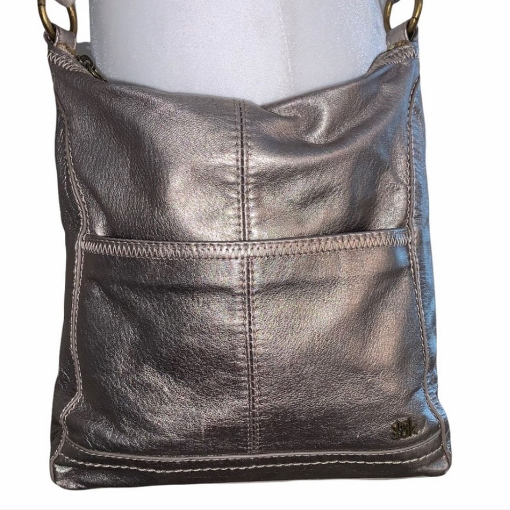 The Sak metallic leather crossbody rose gold soft adjustable strap